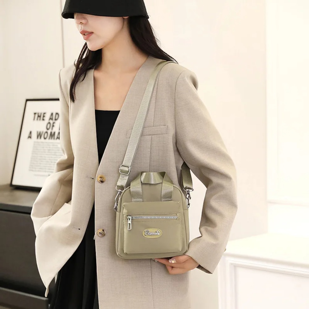 Tas Selempang Wanita Kasual Ta - Accordion Wallet Zip ulasan dan harga